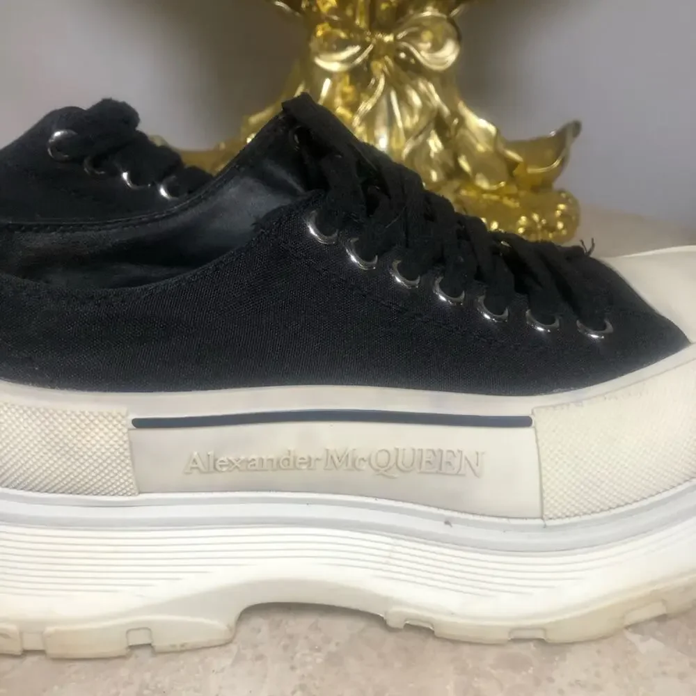 Alexander McQueen black and white platform chucks.